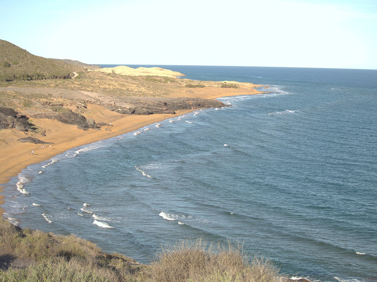 The unspoilt beach of Calblanque regional park with dunes and hills