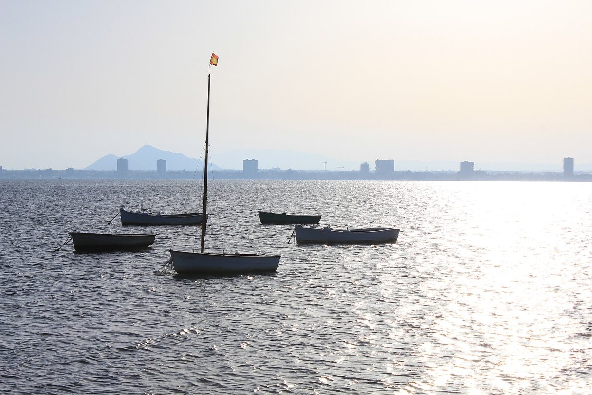 Small boats on the calm water of the Mar Menor
