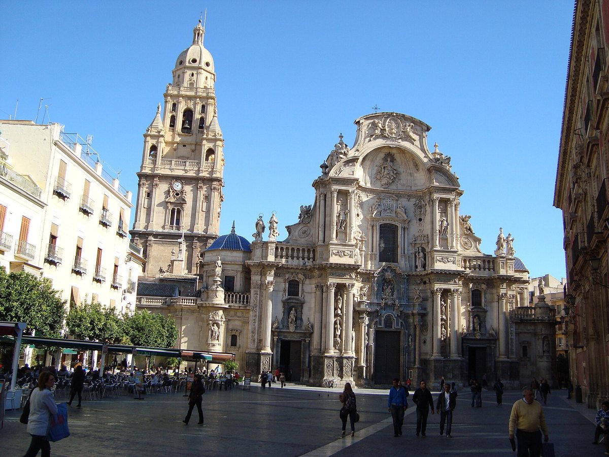 The baroque façade and bell tower of Murcia Cathedral on Plaza del Cardenal Belluga