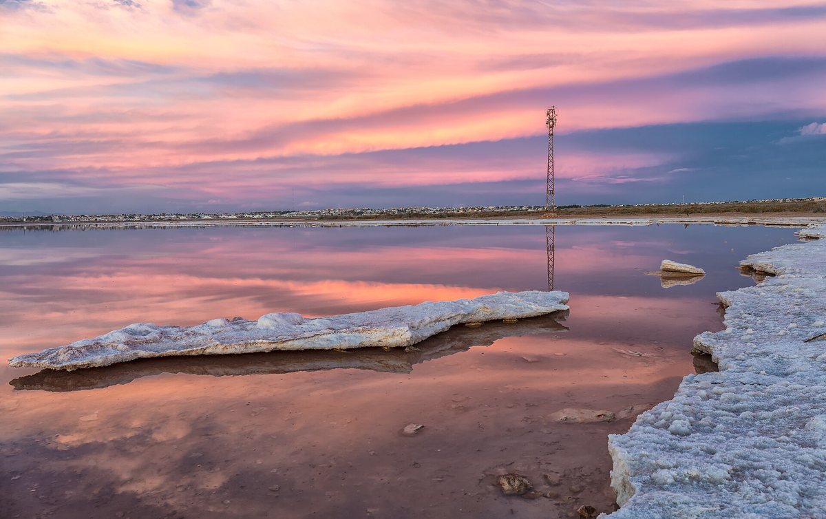 Pink water and white salt crusts in the Torrevieja lagoon