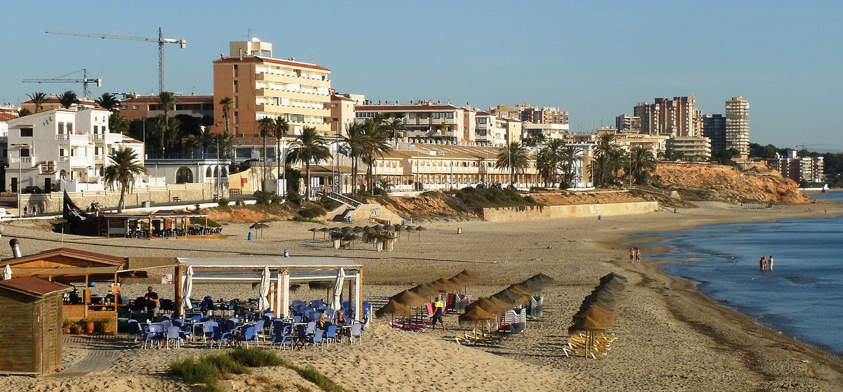 Mil Palmeras beach with beach bars and apartments