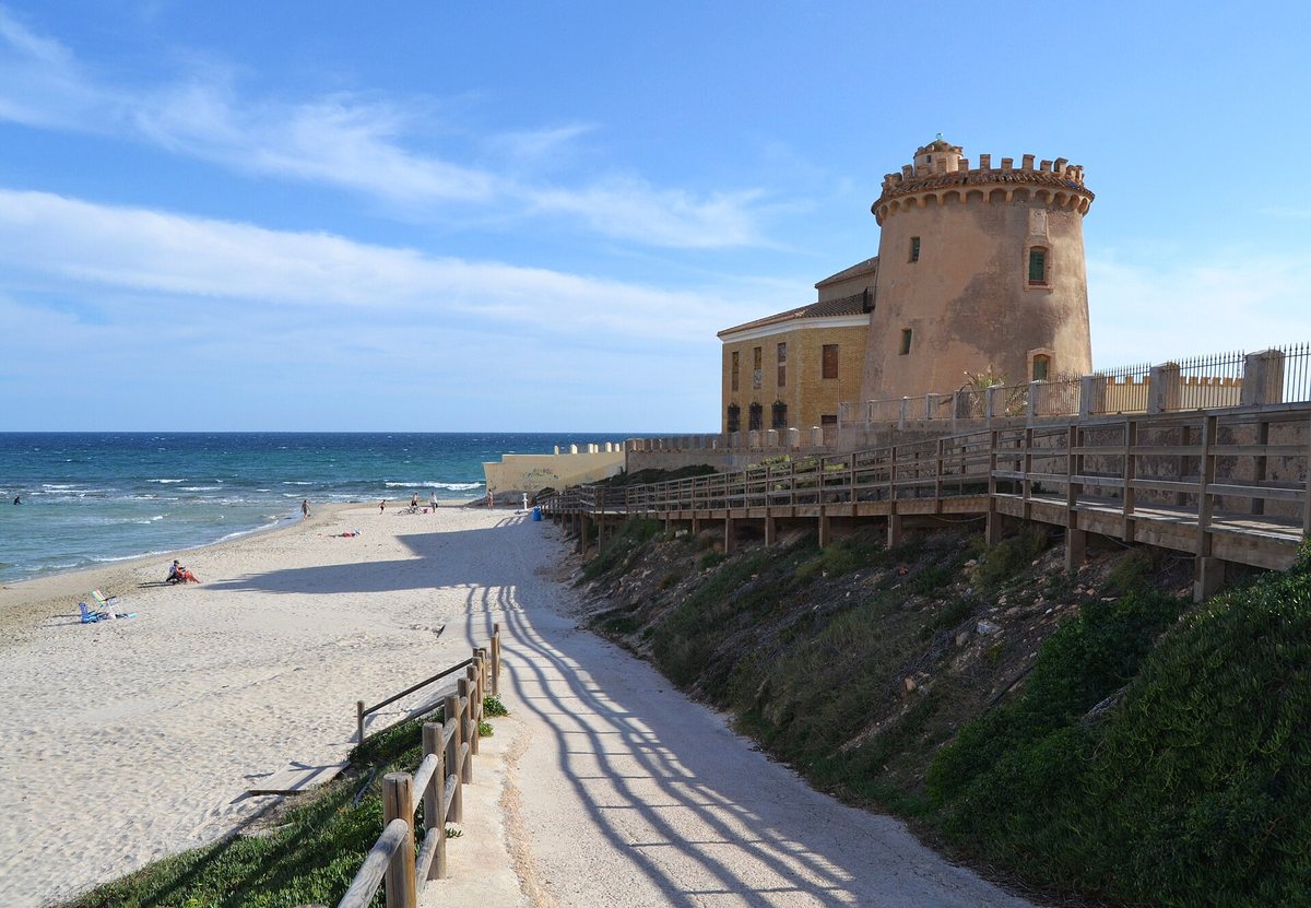 The 16th-century watchtower of Torre de la Horadada above El Conde beach